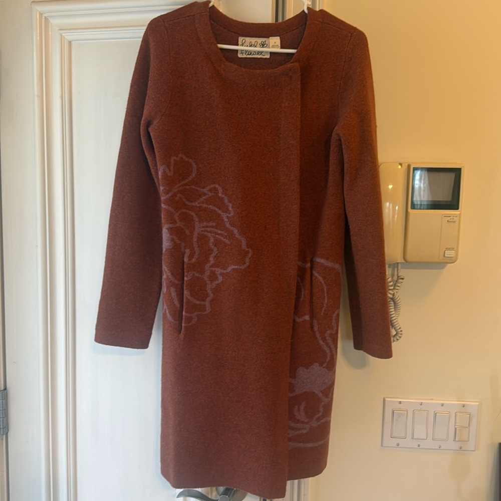 Brand new Anthropologie woolen long jacket . Elegant and worm .